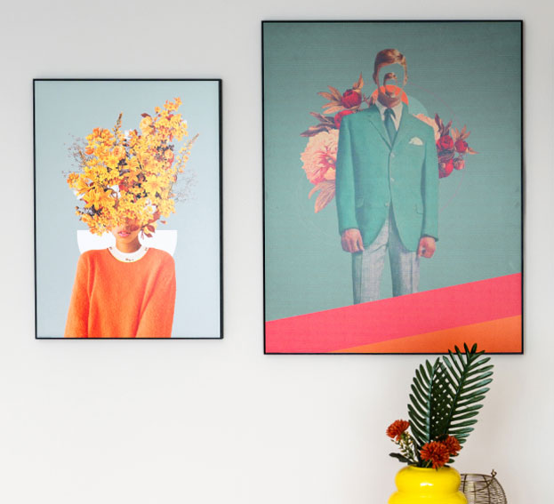 Two surrealist artworks on the wall – left: a portrait with yellow flowers instead of a head, right: a suited man with a floral collage in the background